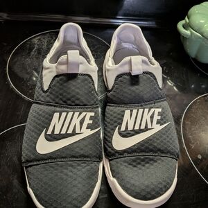 Nike Men's Black and White Slip-On Shoes